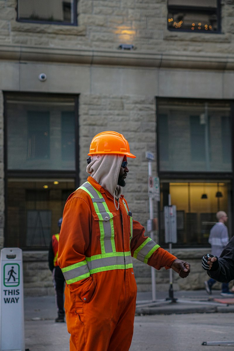 Construction worker with hard hat on site