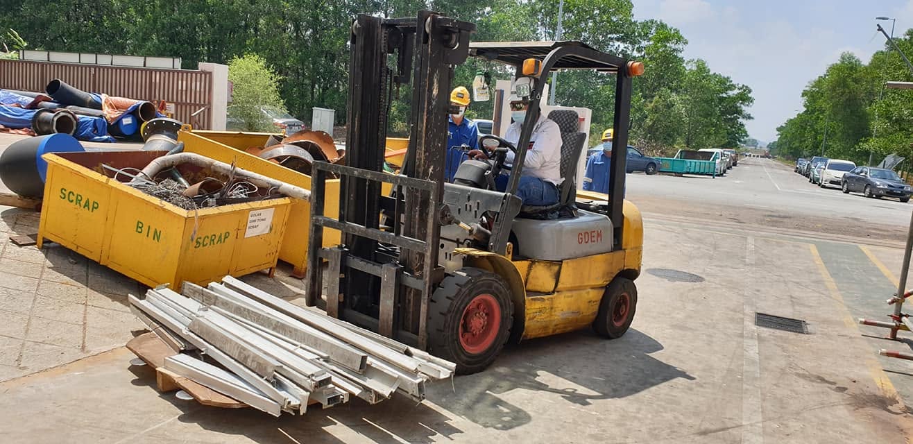 Forklift competency training demonstration in a warehouse facility